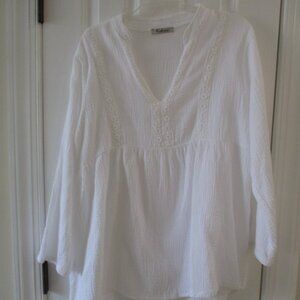 White gauze embroidered long sleeve top.